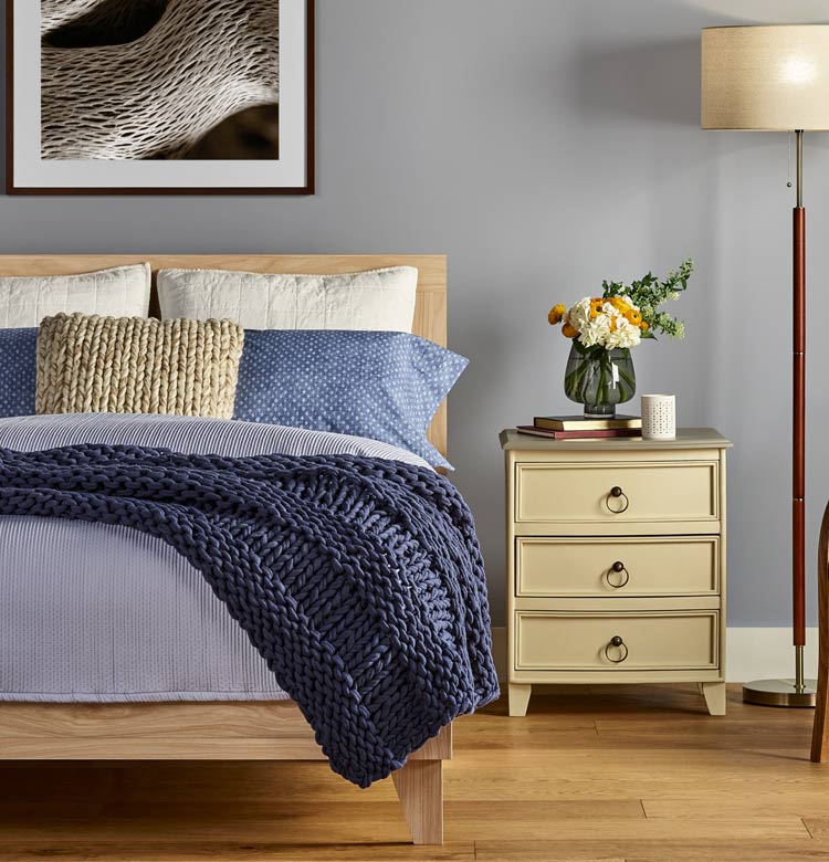 Bedroom with new oak hardwood flooring from Flooring Canada